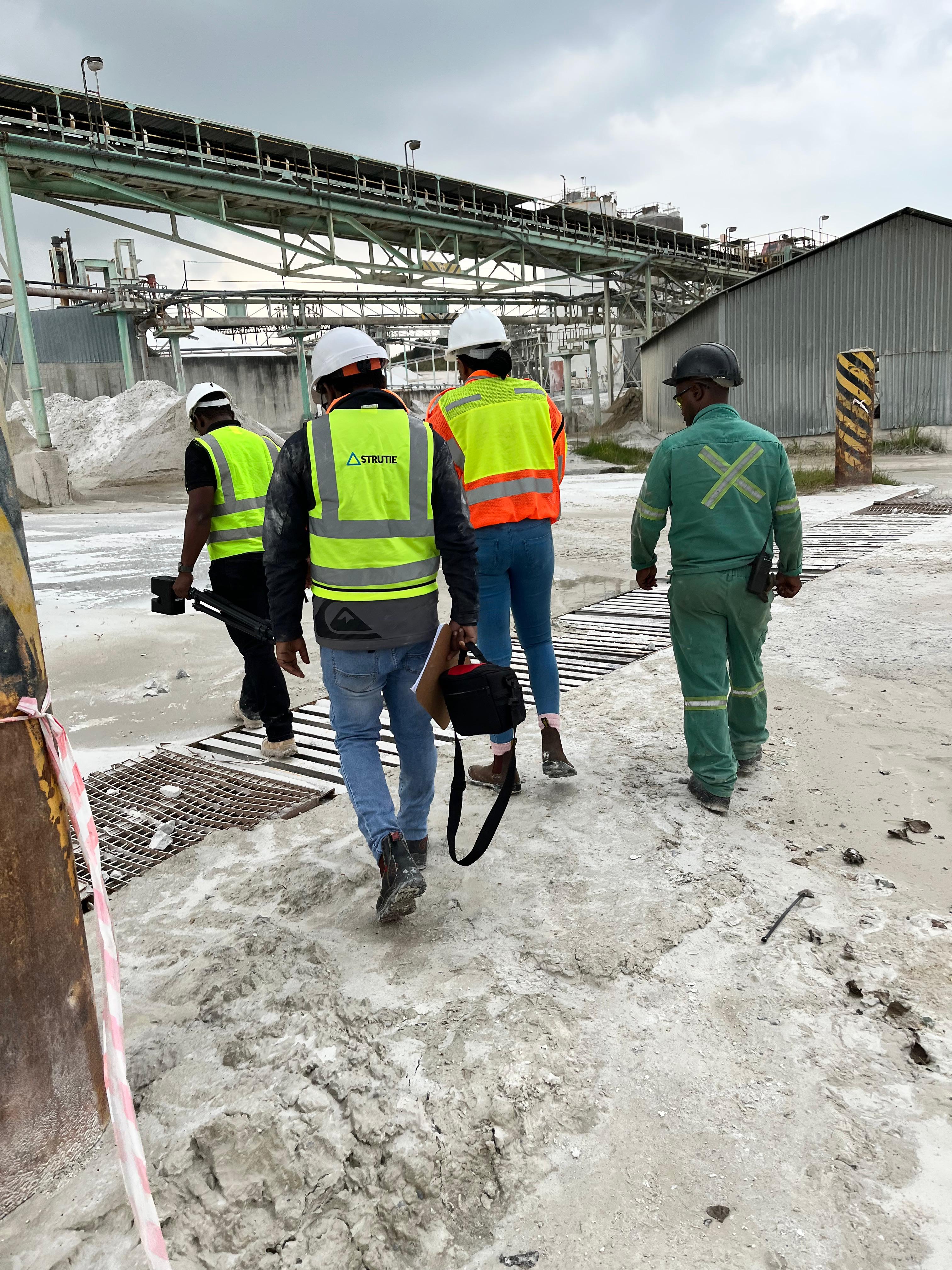 Engineering professionals reviewing structural plans